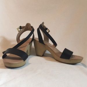 Black heeled sandals with ankle strap